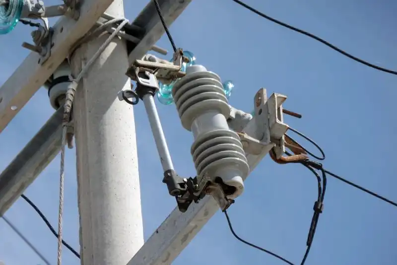 Drop-out fuse installed on utility pole