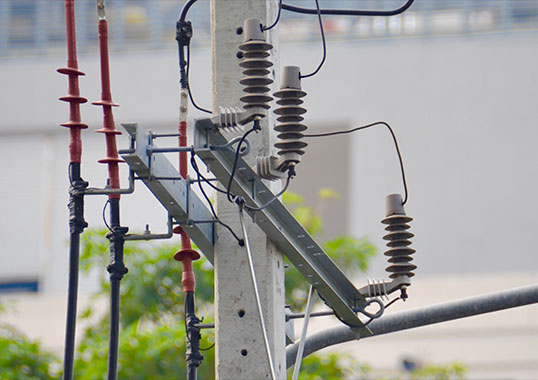Distribution arresters mounted on crossarms