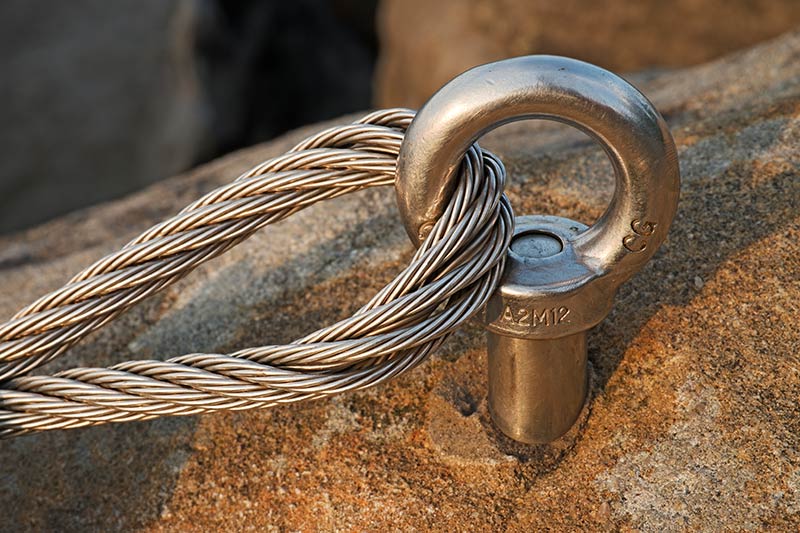 Steel eyenuts: roles in power and stadium systems